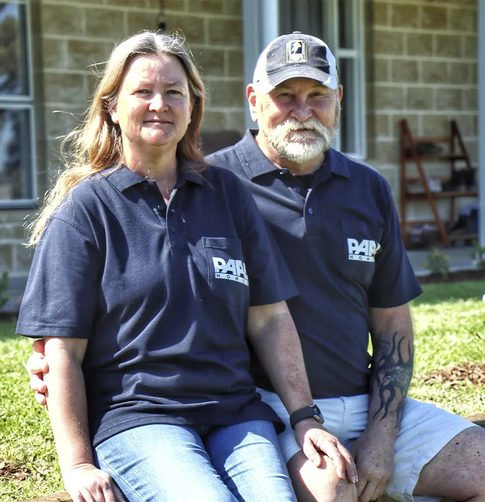 Dan and Bronwyn Mangan in front of their kit home